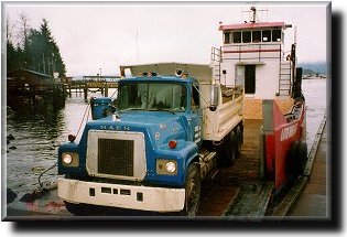 Loading a dump truck on the M/V Lite Weight