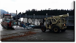 20150728_094142-Damaged amphibious plane with wings removed for transport.jpg