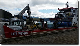 20150802_105441-Empty propane, 3000 gallons septic tank waste, 21' Alumaweld, excavator and forklift.jpg